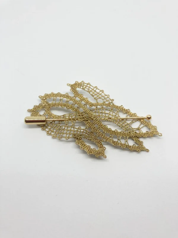 kolekcija večplastna, zlata broška